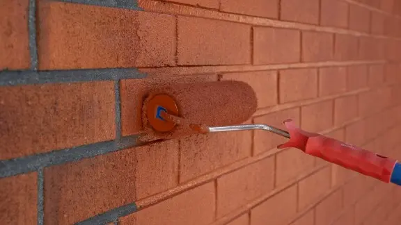 Painting a brick house