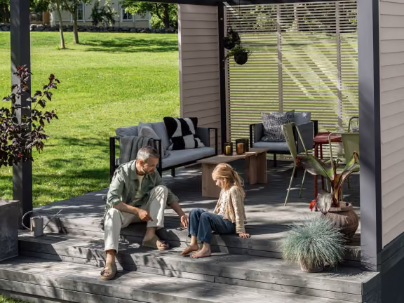 enjoying newly painted wooden decking
