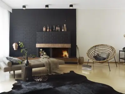 Tumma tiiliseinä huoneen keskipisteenä