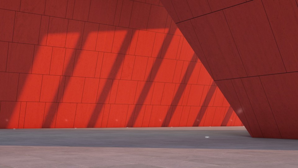 Punainen seinä, jossa näkyy valon ja varjon eroja.