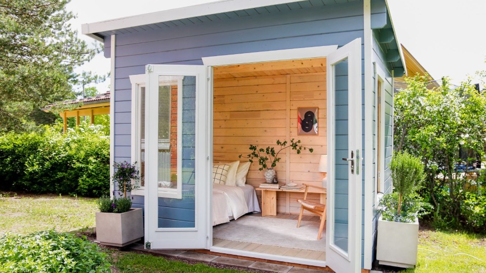 wooden garden cabin with soothing colours