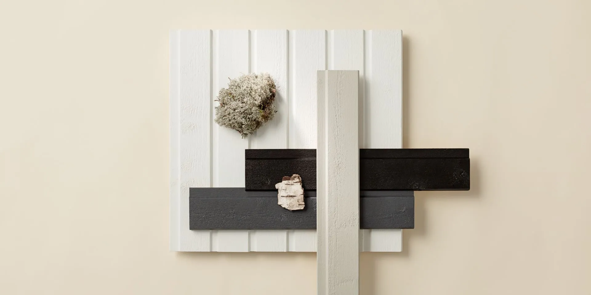 Valkoinen puujulkisivu