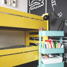 Keltainen lasten kerrossänky